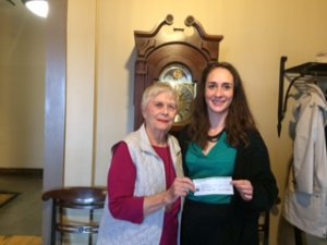 Photo: Ms. Janice Sutton presenting a cheque for $10,000 to Kathleen White of Resolve Counselling Services Canada